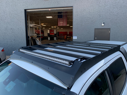 Top view of Economy Roof Rack on a white Toyota Tacoma - Cali Raised LED