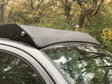 Close up view of gray Toyota Tacoma with Premium Roof Rack with covered light bar - Cali Raised LED